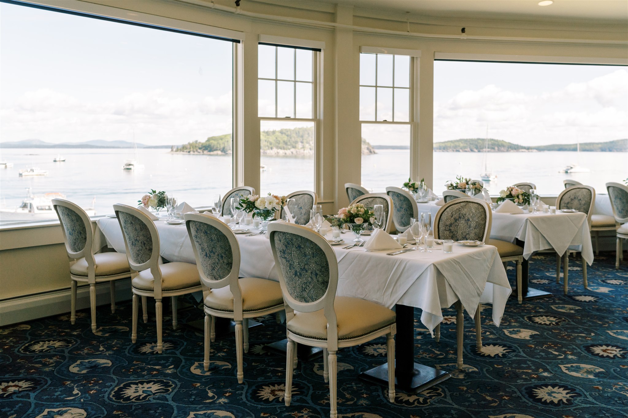 Wedding Reception tables set at the Reading Room Restaurant at the Bar Harbor Inn